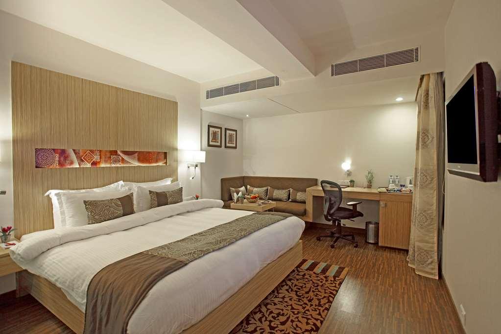 Comfort Inn Legacy Rajkot Rum bild
